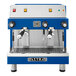A blue and silver Astra Mega II compact espresso machine with two coffee cups on top.