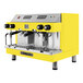 A yellow and silver Astra Mega II espresso machine.