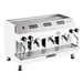 An automatic white espresso machine with three group heads and multiple control knobs, designed for commercial use.