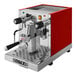 A red and silver Astra Gourmet espresso machine.