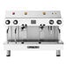 A white Astra Mega II espresso machine with silver knobs and buttons.