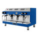 An Astra Mega III blue and silver automatic espresso machine.