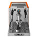 An Astra Gourmet orange and silver espresso machine with an orange and black handle.
