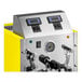 An automatic two-wand milk and beverage steamer with a gloss yellow exterior and digital controls.