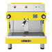 A yellow Astra Mega I semi-automatic espresso machine.