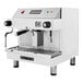A white Astra Mega I automatic espresso machine with buttons and a display.