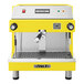 A yellow Astra Mega I automatic espresso machine.