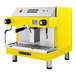 A yellow and silver Astra Mega I automatic espresso machine with a black handle.