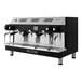 A black and silver Astra Mega III espresso machine.