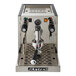 A silver and black Astra Gourmet espresso machine with a gauge.