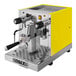 A yellow and silver Astra Gourmet semi-automatic espresso machine.