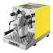 A yellow and silver Astra Gourmet pour-over espresso machine.