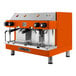 An Astra orange and silver semi-automatic espresso machine with two coffee machines.