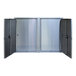 A stainless steel Omnimed twin narcotic cabinet with metal doors and locks.