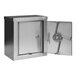 A close-up of the open door of a metal box with a metal lock.