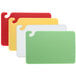 Four San Jamar color-coded cutting boards with handles.