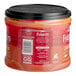 A plastic container of Folgers Colombian ground coffee with a red lid.
