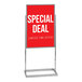 A chrome rectangular tube stand pedestal with a red sign with white letters on a white background.