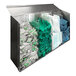 An Omnimed metal bin with four compartments holding different types of medical items.