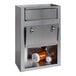 A stainless steel Omnimed medication drop box with the door open and two bottles of medicine inside.