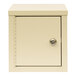 A beige steel mini wall-mount narcotics cabinet with 2 key locks.