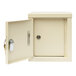 A beige steel Omnimed mini wall-mount narcotics cabinet with 2 key locks.