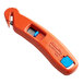 An orange utility knife with blue and blue blades.