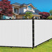A large white SEALTECH privacy fence screen on a fence.
