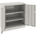 A light gray metal storage cabinet with open doors.