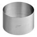 An Ateco stainless steel round cake mold with a small metal band.