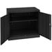 A black Tennsco metal storage cabinet with open doors.
