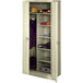 A putty metal Tennsco combination cabinet with open solid doors.