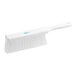 A white Ateco counter duster with blue trim on the bristles.