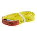 A yellow woven rope with a white label and a white strip.