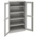 A light gray metal storage cabinet with open doors.