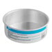 A round silver Ateco cake pan with a blue and white label.