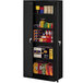 A black metal Tennsco storage cabinet with solid doors and shelves full of items.