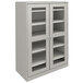 A light gray Tennsco storage cabinet with C-Thru doors.