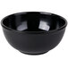 A black Cal-Mil round melamine bowl.