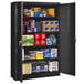 A black Tennsco jumbo storage cabinet with many items inside.