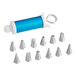 A blue Ateco decorating syringe with a white handle next to silver tips.