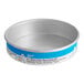 A round cake tin with a blue and white label on it.