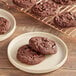 A plate of Root Nine Baking Co. fudgy brownie cookies.