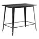 A Lancaster Table & Seating black rectangular bar height table with black metal legs.