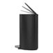 A matte black simplehuman semi-round step-on trash can with a white liner pocket lid.