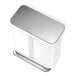 A white simplehuman rectangular dual compartment step-on trash can with a silver lid.