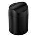 A simplehuman matte black stainless steel countertop trash can with a swing top lid.
