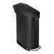 A simplehuman matte black stainless steel rectangular slim step-on trash can with a lid.