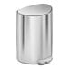 A brushed stainless steel simplehuman semi-round trash can with a lid.