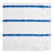 A white towel with blue stripes.